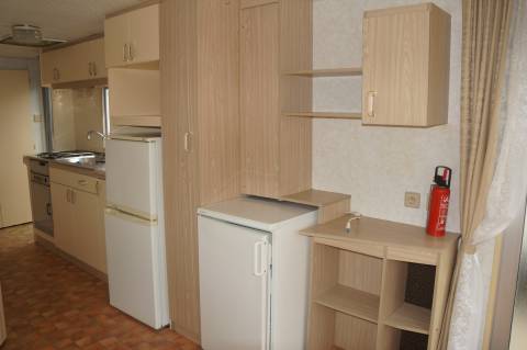 meuble télévision et cuisine du mobil home abi eurosites 1995