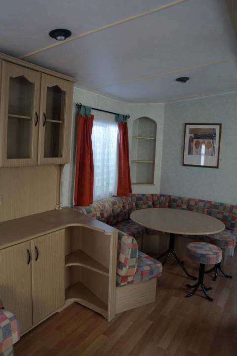 Meuble et coin repas du mobil home occasion Cosalt Excellence 2008