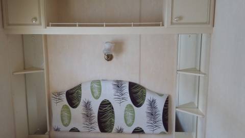 Tête de lit avec rangemets  mobil home occasion ABI Montrose 