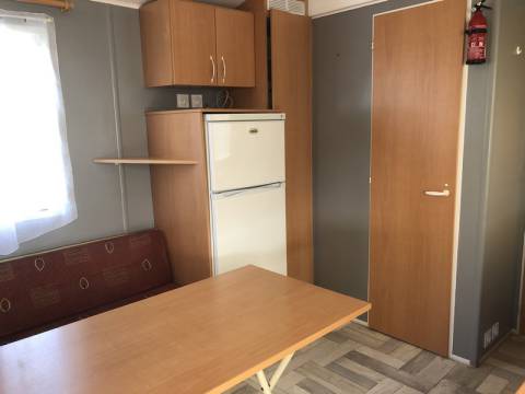 Espace salle à manger du mobil home d'occasion sur parcelle 2ch IRM Titania