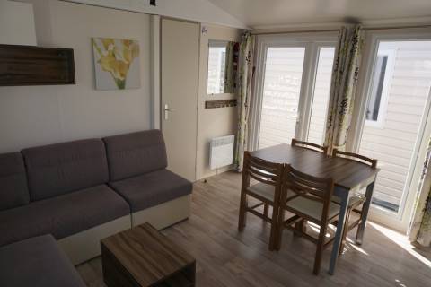 Salle à manger du mobil home 3 chambres d'occasion IRM Luminosa