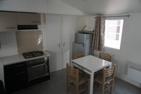 Pièce à vivre du mobil home d'occasion 2 chambres IRM ELEGANZIA 2018