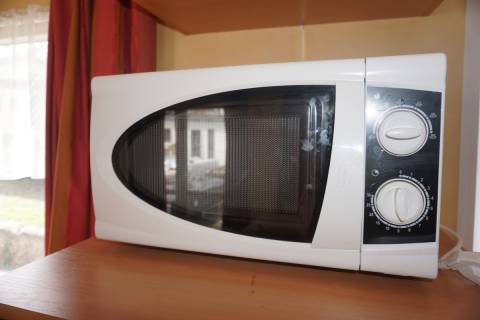 Micro-ondes du mobil home occasion 2 chambres IRM Super Titania Confort 2004