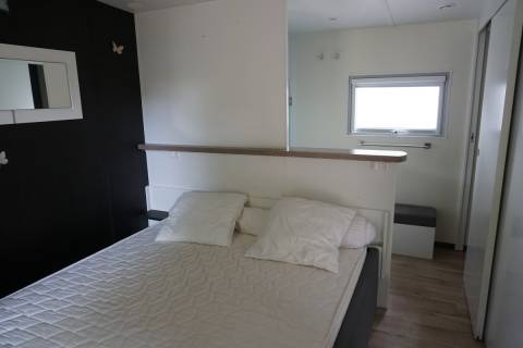 Chambre parentale du mobil home d'occasion Louisiane Taos F6 2012