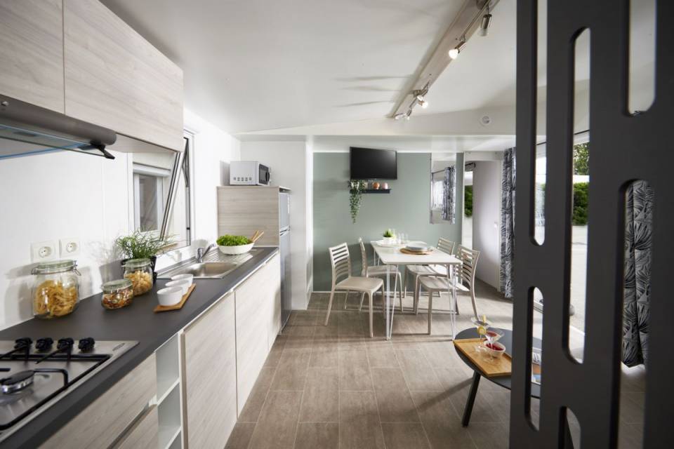 Pièce à vivre du mobil home neuf TRIGANO Evo 35 2021 2 chambres et 2 salles d'eau
