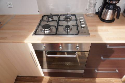 Four et plaque de cuisson du mobil home occasion 2 chambres IRM Riviera 2007